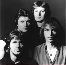 Original lineup in 1982(clockwise from bottom left): John Wetton, Carl Palmer, Geoff Downes, Steve Howe