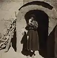 Assyrian woman spinning wool (1939)