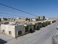 Part of old Ataq city with some modern buildings.