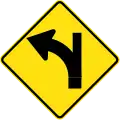 (W2-16) Side road intersection, entering straight ahead on a curve on left