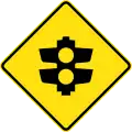 (W3-Q01) Ramp Metering (or Roundabout Metering) Signals ahead (Used in Queensland)
