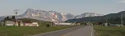 The mountains of Glacier National Park rising to the west over Babb