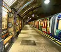 London Underground trains at Baker Street station marking 150 years since the foundation of the Metropolitan Railway, the world's oldest underground metro system