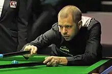 Barry Hawkins playing a shot