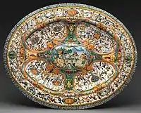 Basin or dish with The Gathering of Manna and extensive grotesques, 1620–45, probably made as a pair to an Italian dish of the 1560s.
