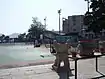 A basketball court outside the temple