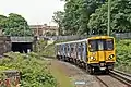 A Merseyrail Class 508 approaches the station, from Liverpool.