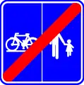 F101b: End of a road or part of a road reserved for pedestrians, cyclists horse riders and drivers of speed pedelecs with segregation