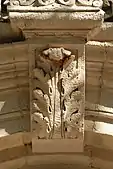 Acanthus leaf of the window above the entrance of the Maison presbytérale de l'église Notre-Dame du Finistère (Brussels, Belgium)