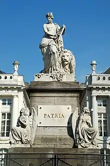 The Monument to the Martyrs of the 1830 Revolution in Brussels, Belgium surmounted by Liberty and Leo Belgicus.