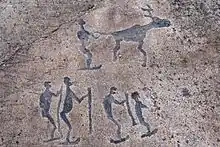 Karelian Petroglyph depicting 5 skiers and a reindeer. These petroglyphs date to 7,000~6,000 years BP.