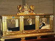 The body of Saint Bernadette of Lourdes with wax face and hand coverings, declared to appear incorrupt by a committee in 1909 (subsequent exhumations indicated corruption). (b. January 7, 1844 – d. April 16, 1879).
