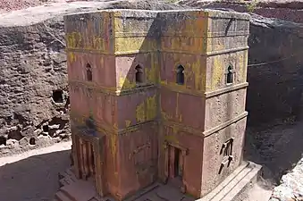 Large, monolithic churches such as the Church of Saint George (Lalibela), were hewn out of the ground in Ethiopia, late 12th or early 13th century