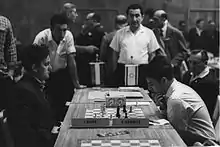 Hungarian and Israeli opponents playing at the 16th Chess Olympiad, held at the first Sheraton in 1964