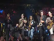 Billy Joel Band in 2007. Carl Fischer (left), Andy Cichon, David Rosenthal (background), Crystal Taliefero, Mark Rivera and Tommy Byrnes