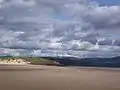 Black Rock Sands Beach looking towards Both-y-Guestm,Ynys Cyngar and the Afon Glaslyn  estuary.