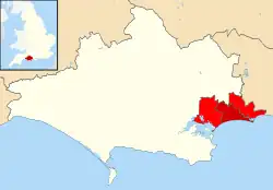 Location of the former Borough of Bournemouth (dark red) within Bournemouth, Christchurch and Poole (red), and Dorset