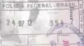 Brazilian exit stamp in a US passport.