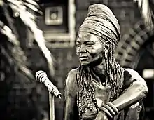 Angus Taylor's life-size bronze sculpture of Brenda Fassie outside Bassline, a music venue in Johannesburg. The Sunday Times commissioned the tribute, which was installed in March 2006.