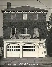 Facade of a three-story brick fire station