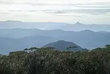 As seen from Mount Budawang, (Pigeon House on right horizon)