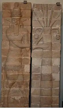 Bull-man protecting a palmtree, Decorative brick panel from the outer wall of a temple to Inshushinak at Susa (12th century BC)