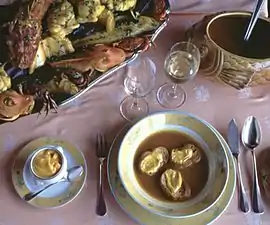 A traditional bouillabaisse from Marseille, soup and fish served separately