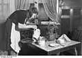 Ostarbeiterin from Kiev performing domestic labor, January 1945 (SS image)