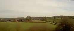 view of Burton-le-coggles from the train