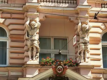 Atlantes on main facade, 1st floor balcony