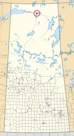 A map of the province of Saskatchewan showing 297 rural municipalities and hundreds of small Indian reserves. One is highlighted with a red circle.