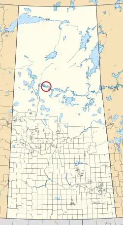 A map of the province of Saskatchewan showing 297 rural municipalities and hundreds of small Indian reserves. One is highlighted with a red circle.