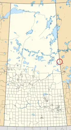 A map of the province of Saskatchewan showing 297 rural municipalities and hundreds of small Indian reserves. One is highlighted with a red circle.