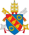 Julius III (1550-1555) Azure, on a bend gules fimbriated and between two olive [sometimes laurel] wreaths or, three mountains, each of as many summits, of the last.