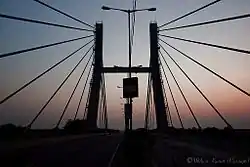 A straight view of the hanging bridge built on the National Highway 75, right over the Krishnarajapura Railway station