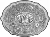 Oval frame, composed of a small illustration in the centre surrounded by a dozen medallions that occupy most of the frame. The central illustration represents a dozen characters, some of whom are dancing, as well as two angels.