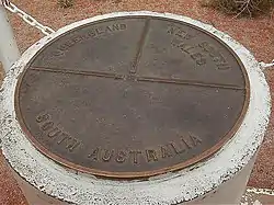 Cameron Corner Survey Marker, the point where the borders of the Australian states of New South Wales, Queensland and South Australia meet.