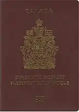Cover of Canadian Diplomatic e-Passport.  Cover is maroon colour with a gold-coloured crest.  Text reads "CANADA" and "DIPLOMATIC PASSPORT" and "PASSEPORT DIPLOMATIQUE"