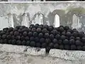 Cannonballs at Cape Coast Castle, a structure used in the Trans-Atlantic Slave Trade.