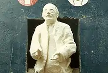 Original statue of Jung in Mathew Street, a half-body on a plinth captioned "Liverpool is the pool of life"