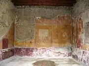 Photograph of Roman ruins, painted with big blocks of yellow colour.