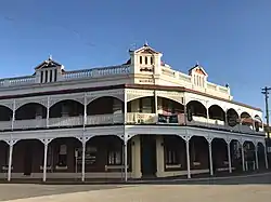 Castle Hotel, York; verandah and timber fretwork added c.1905.