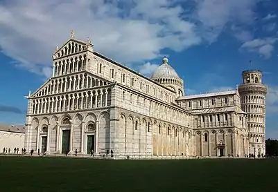 Pisa Cathedral, Italy, has a free-standing campanile and presents a harmony of polychrome and arcades.