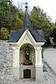 Shrine of Saint Lucy next to church and cemetery