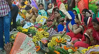 Women waiting with Prasada for offerings