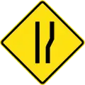 Road widens ahead on right side
