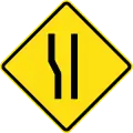 Road widens ahead on left side