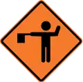 Traffic flagger ahead