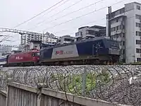 HXD3C-0927 is tracted Beijing-Nanning-Hanoi Through Train with HXD3D-0061 in Guilin.