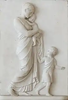 marble fresco of woman and two young children representing Christian charity from the Louvre